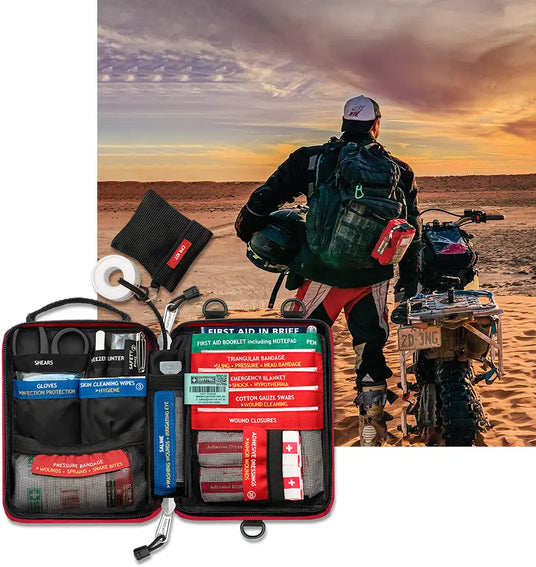 Handy first aid kit attached to backpack of motorbike rider